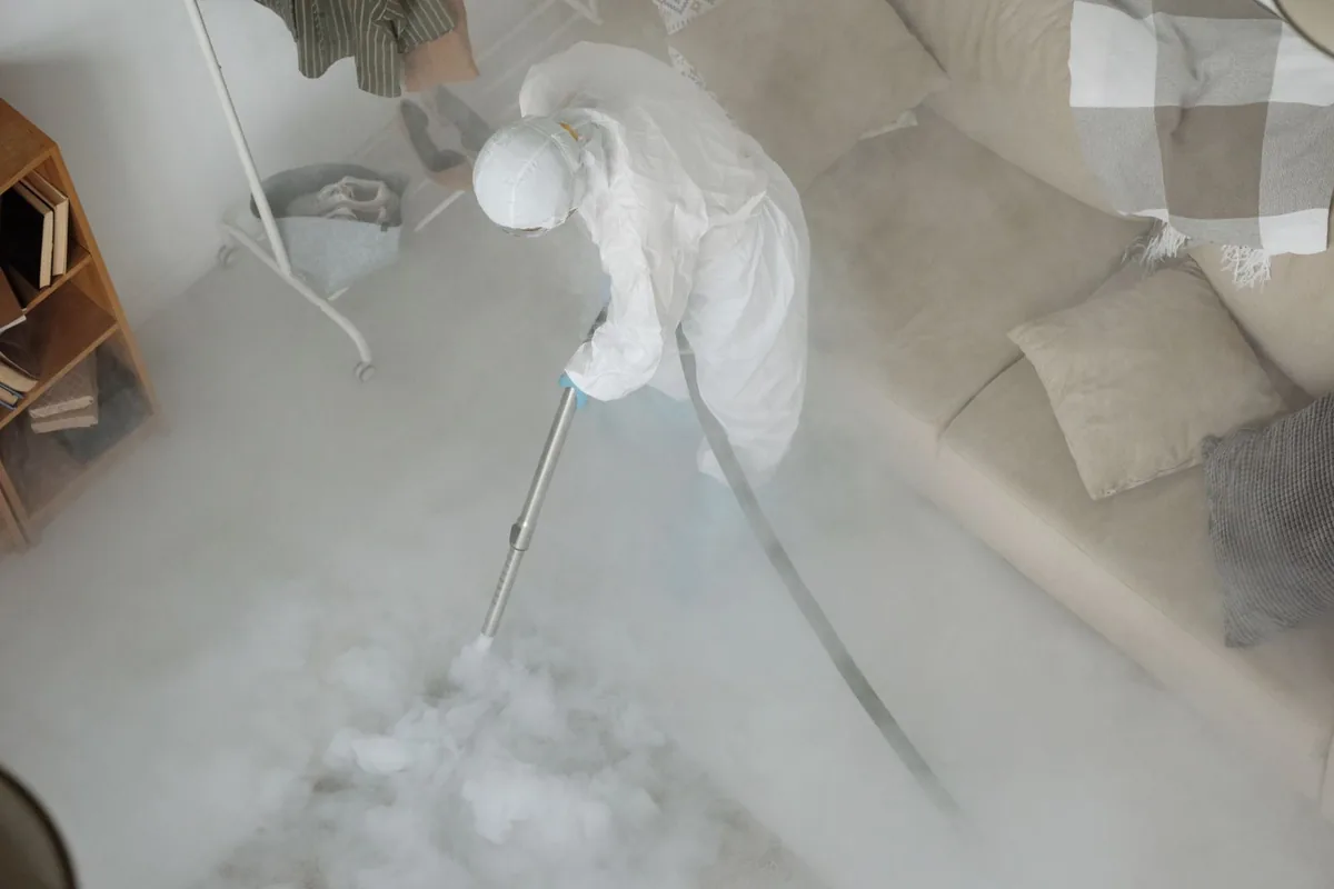 Biohazard cleanup technician in protective equipment, Crewe, VA